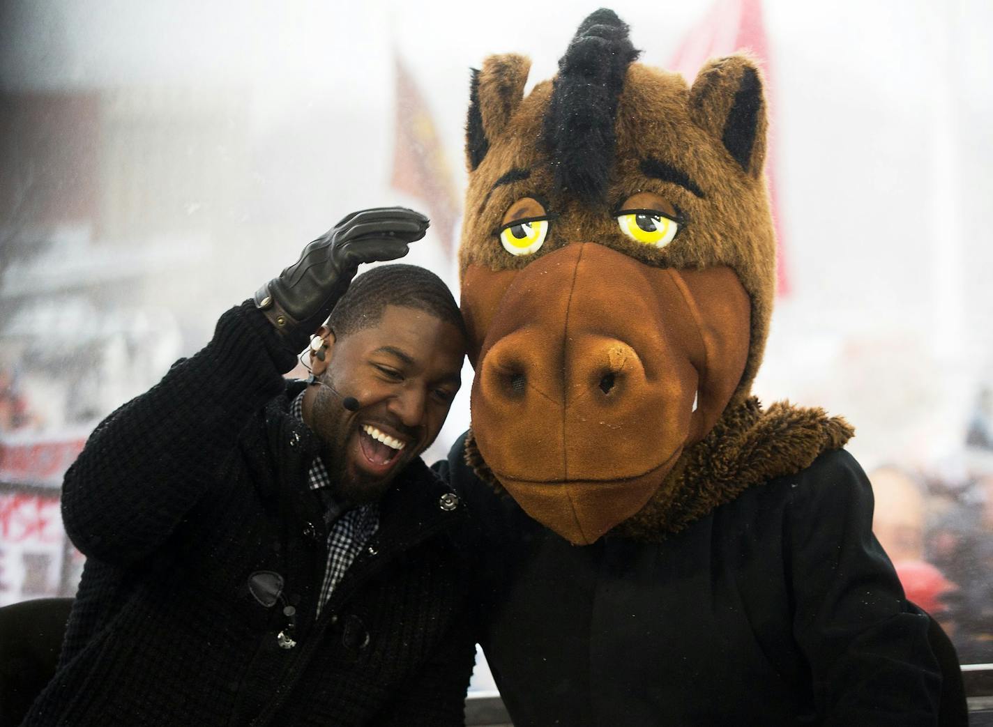 Kalamazoo native Gregg Jennings, left, and Lee Corso both select Western Michigan to defeat Buffalo in a NCAA college football game during a broadcast for ESPN's "College GameDay" in Kalamazoo, Mich., Saturday, Nov. 19, 2016. (Bryan Bennett/Kalamazoo Gazette-MLive Media Group via AP) ORG XMIT: MIKAL203