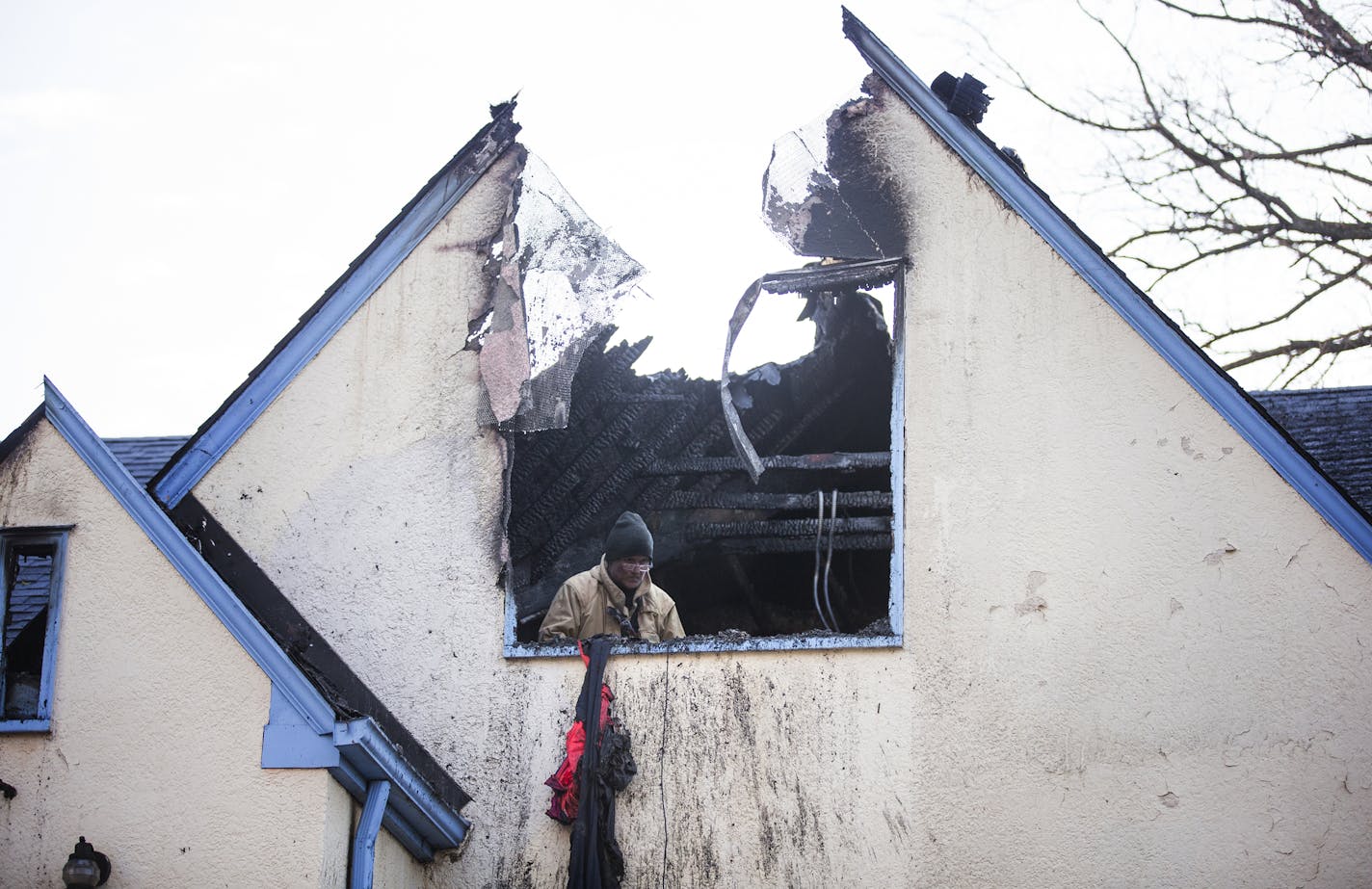 An investigator with the Minneapolis Fire Department investigates the second floor of a home where a fire killed one man in Minneapolis on Sunday, February 21, 2016. ] (Leila Navidi/Star Tribune) leila.navidi@startribune.com BACKGROUND INFORMATION: A residential fire in south Minneapolis early Sunday killed one person, authorities said. The predawn blaze broke out about 4:35 a.m. in the 2900 block of 40th Avenue S., according to the Fire Department. The person who died, a man who probably reside