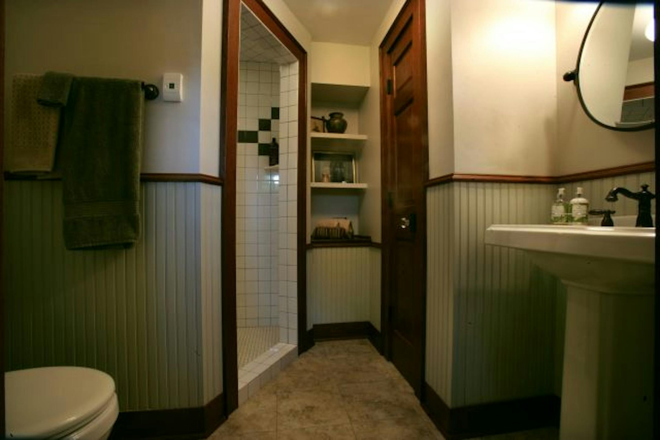 The new first floor bathroom has in-floor heat and is large enough for a shower — an item on Graves' must-have list.