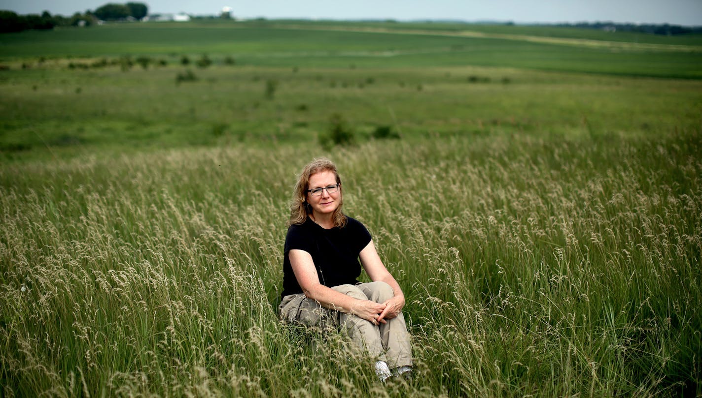 Ann Houghton posed for a portrait on her 80-acre vegetable and lamb farm in Jordan Sunday July 12, 2015 in Jordan, MN. ] Scott County has posed a new road that would run through her property. Jerry Holt/ Jerry.Holt@Startribune.com