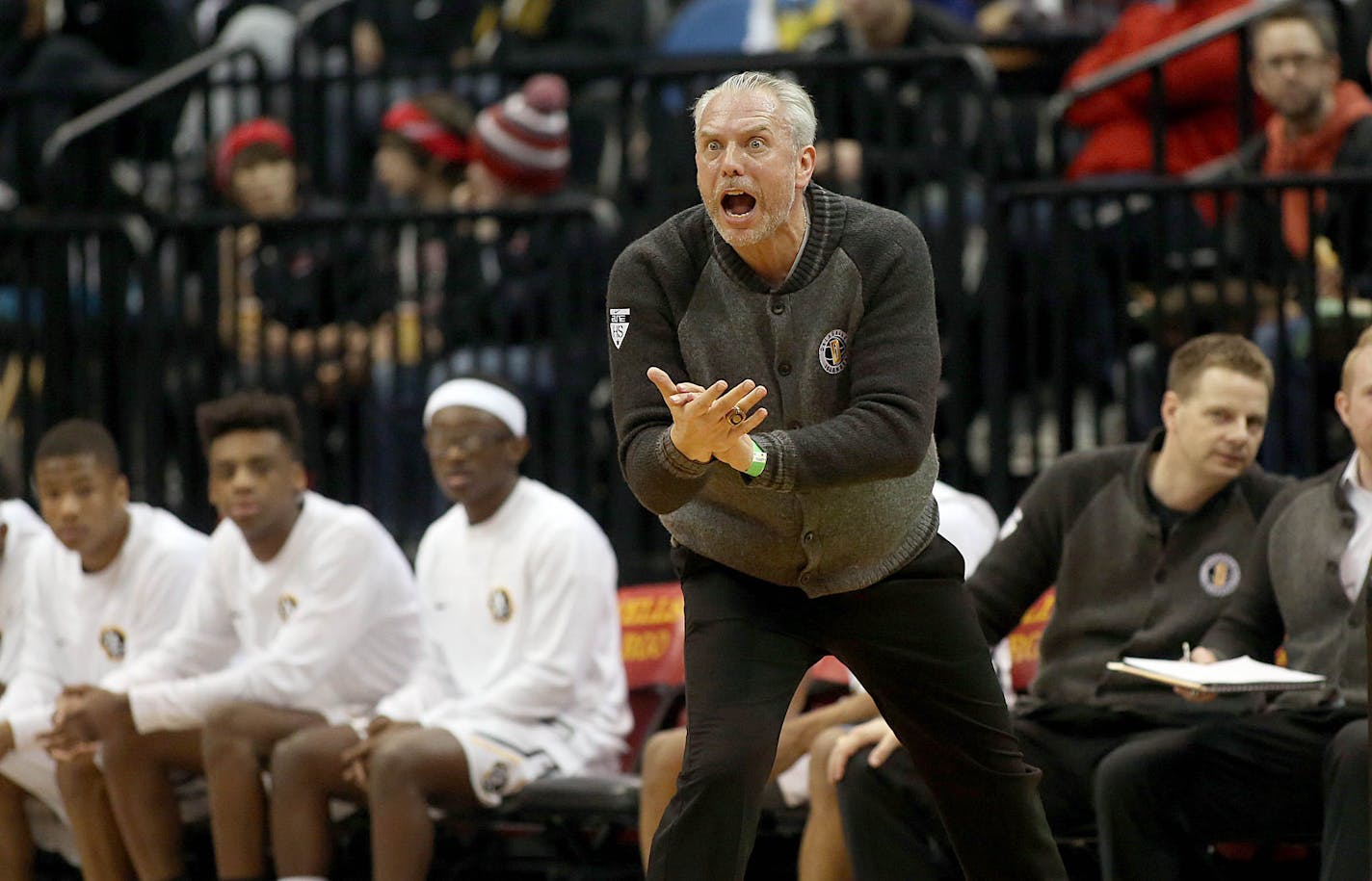 An animated DeLaSalle head coach Dave Thorson relayed instructions from the bench.] JIM GEHRZ • james.gehrz@startribune.com / Minneapolis, MN / March 10, 2016 /12:00 and 2:00 PM – BACKGROUND INFORMATION: Action and reaction from the semifinals of the Class 3A Boys' 2016 State High School Basketball Tournament at Target Center.Noon: DeLaSalle vs Monticello. DeLaSalle won the game, 59-45.2 PM: Red Wing vs Fergus Falls ORG XMIT: MIN1603101425500522