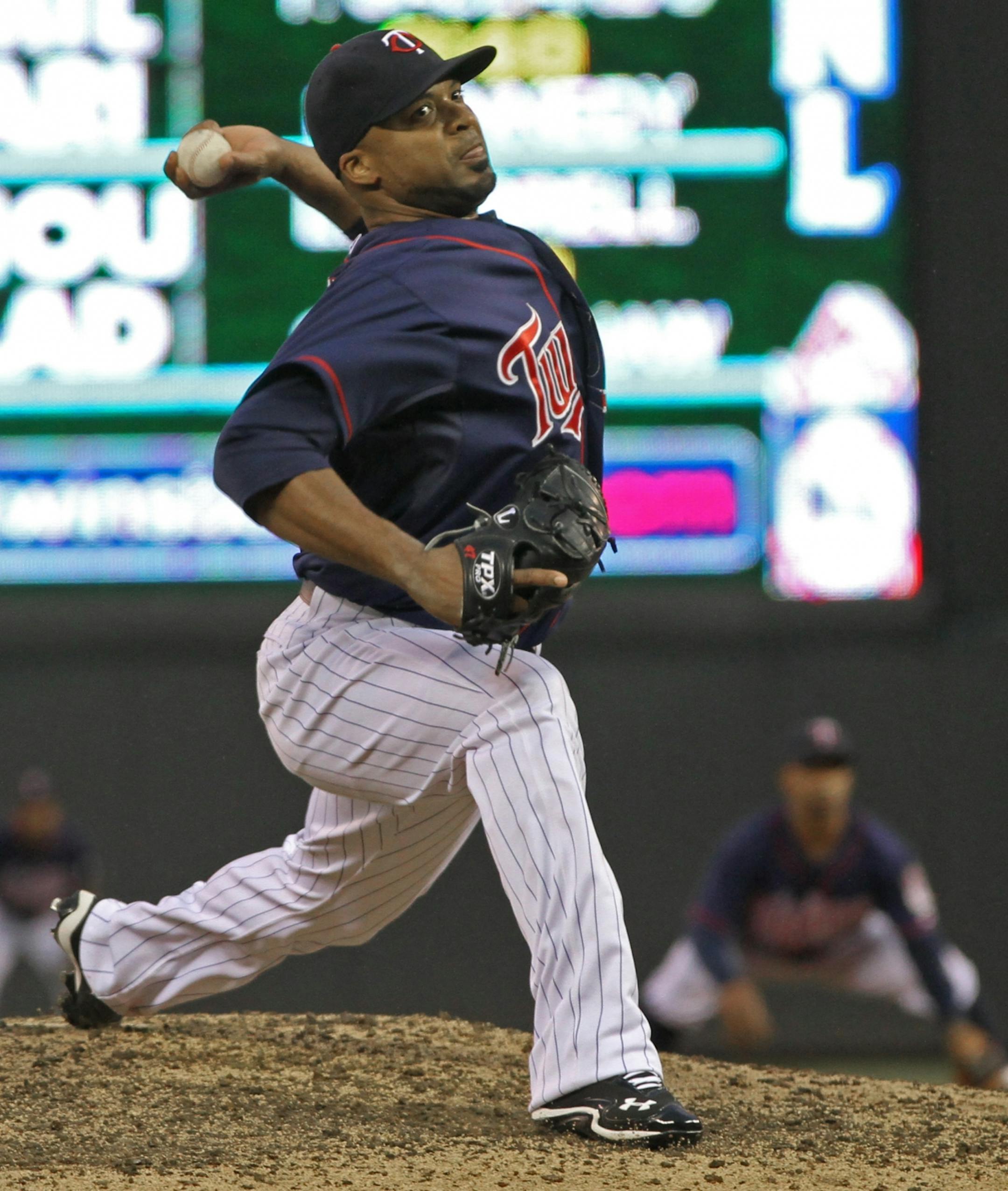 Minnesota Twins vs. Detroit Tigers, 5/25/12. (left to right) Twins Francisco Liriano pitched to Detroit in the 4th inning.