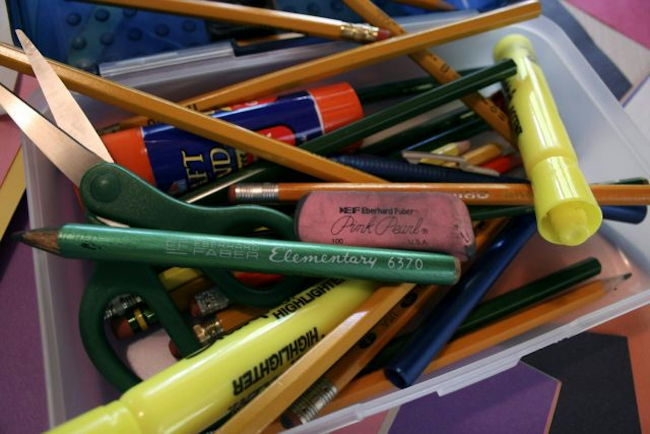 A box of various school supplies are seen in this Sunday, July 13, 2008 photo in West Milford, N.J. Long home to an unchanging bunch of yellow No. 2 pencils and thick pink erasers, the pencil case has gotten a makeover. Thanks to the onslaught of kid-focused marketing and the growing presence of technology in children's lives, those perennial favorites have become so last semester.