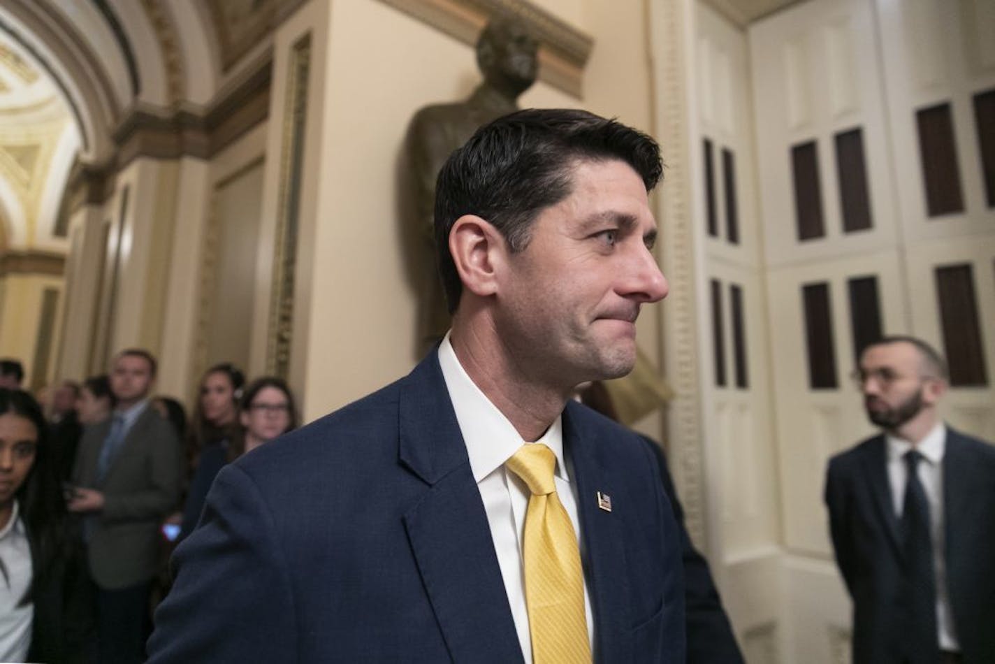 House Speaker Paul Ryan left the chamber Thursday as a revised spending bill is introduced that includes $5 billion demanded by President Donald Trump for a wall along the U.S.-Mexico border.