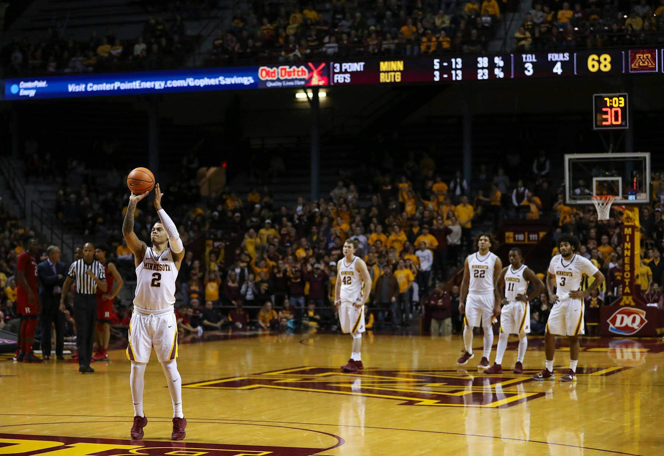 Minnesota Gophers guard Nate Mason (2) shot the first of four free throws after a second half foul combined with a technical foul on Rutgers. He finished with 26 points for the night.