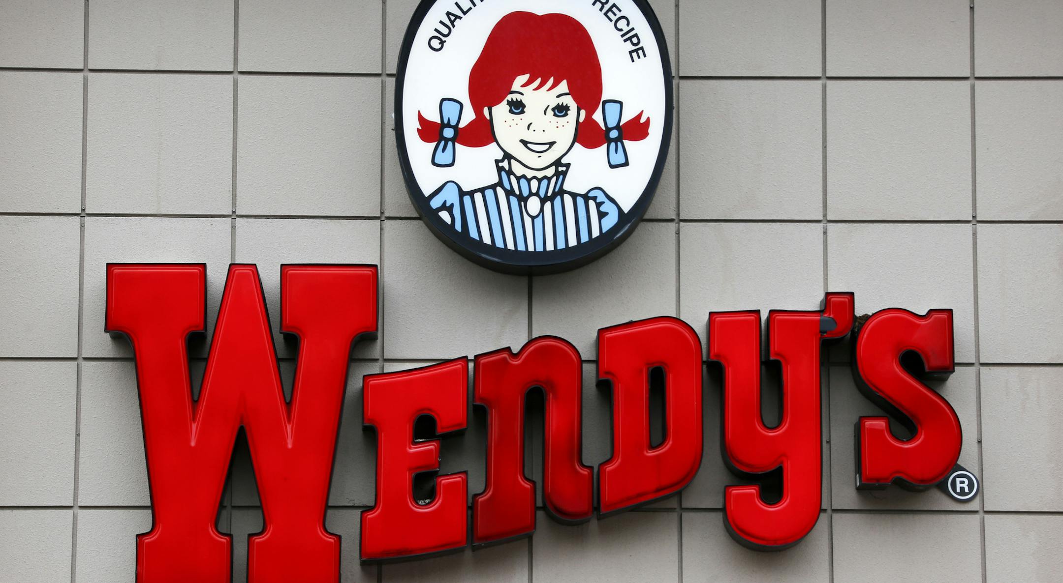 FILE- This Feb. 23, 2018, file photo shows a Wendy's restaurant in Pittsburgh. Wendy’s said Monday, Sept. 10, 2019 it’s relaunching breakfast across the U.S. next year, the latest fast-food chain to amp up its offerings as more consumers eat out in the morning. (AP Photo/Gene J. Puskar, File)