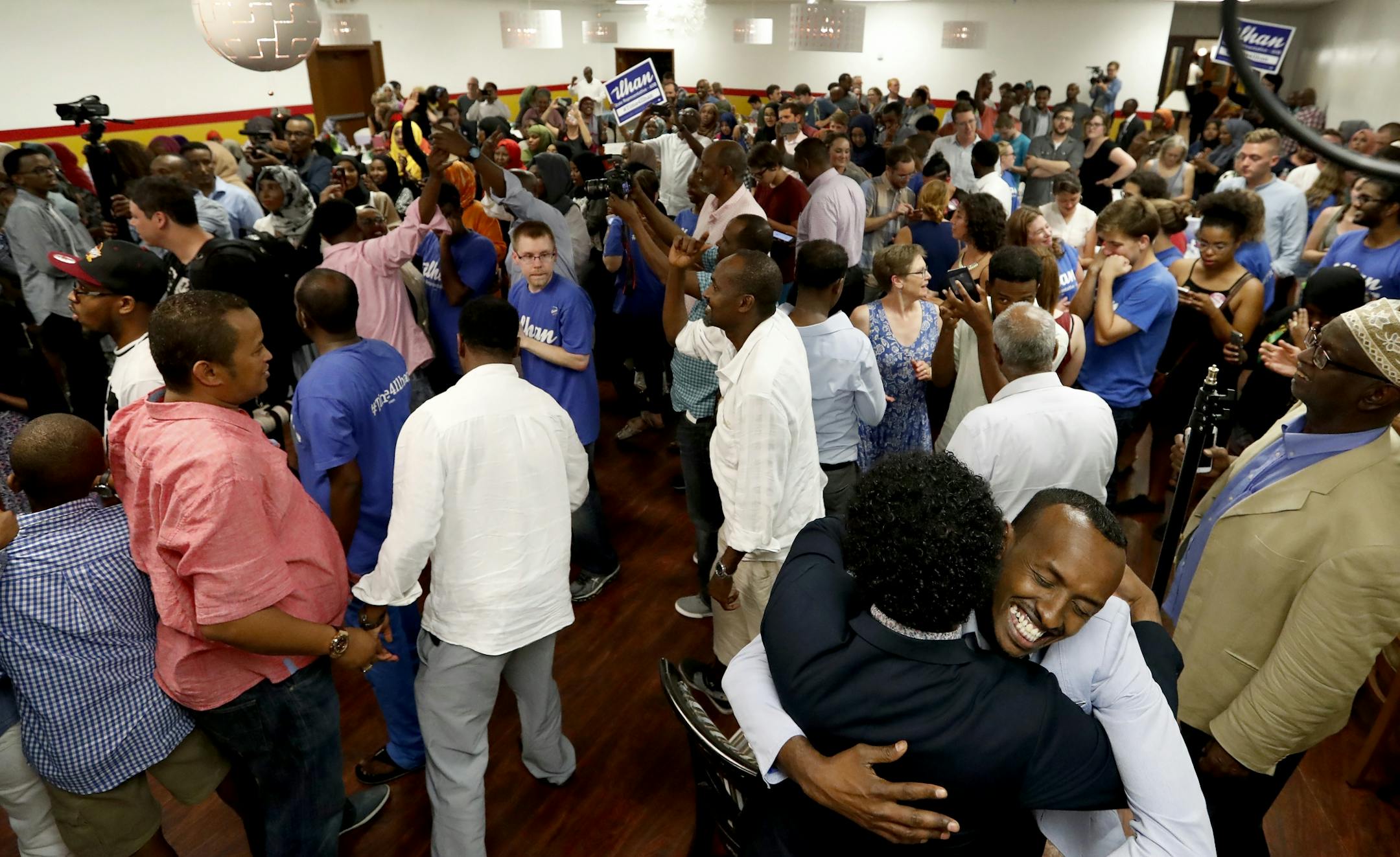 Supporters of Ilhan Omar celebrated after getting the election results at Kalsan in Minneapolis.