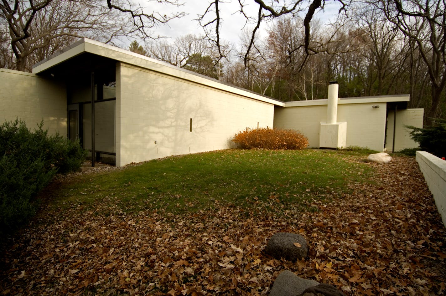 This Marcel Breuer house is tucked into a hill in St. Paul. The L-shaped concrete block house wraps around a private courtyard that has views of downtown St. Paul. It's on the market for $525,000.