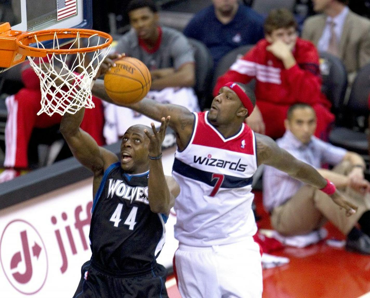 Washington Wizards power forward Andray Blatche (7) blocks the shot os Minnesota Timberwolves power forward Anthony Tolliver (44) during the second half of their game played at the Verizon Center in Washington, D.C., Sunday, January 8, 2012. Minnesota defeated Washington 93-72.