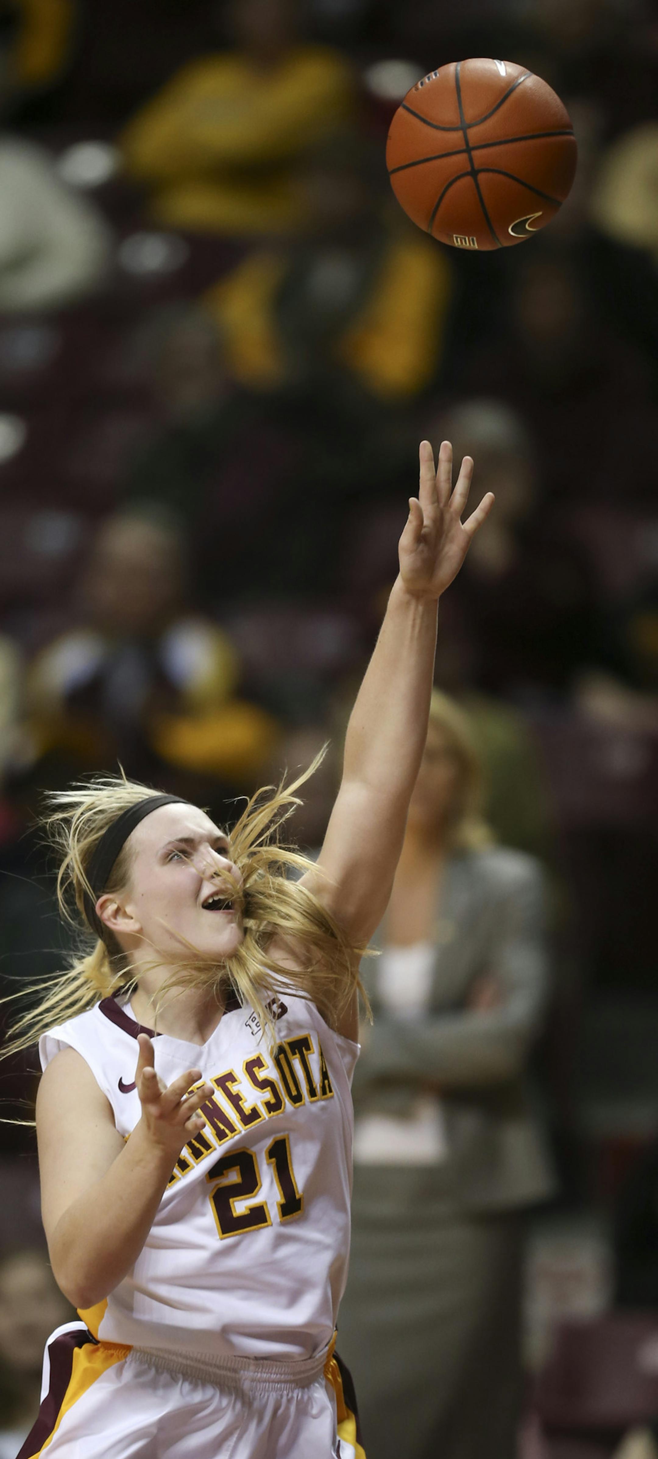 Gophers guard Sari Noga (21) made a second half shot in front of Southern Methodist Mustangs guard Keena Mays (23). Noga led the Gophers with 22 points. ] JEFF WHEELER ‚Ä¢ jeff.wheeler@startribune.com The Minnesota Gophers women beat Southern Methodist University 77-70 in their second round NIT game at Williams Arena in Minneapolis Sunday night, March 23, 2014