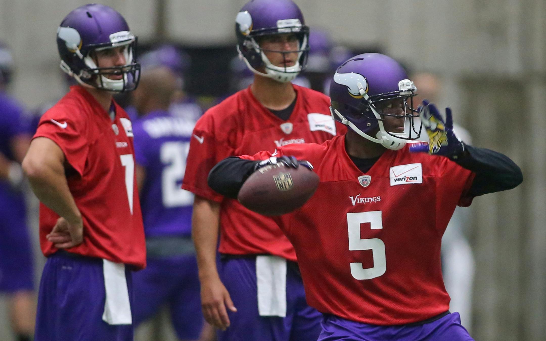 Christian Ponder and Matt Cassel watched as Teddy Bridgewater passed during mini-camp practice at Winter Park in June.