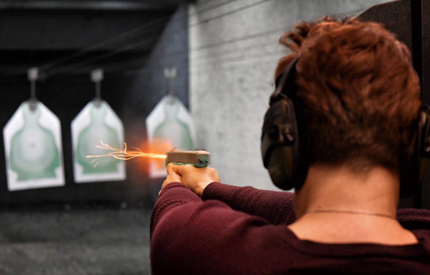 A participant in a conceal carry class fires a round at the Metro Gun Club in Blaine.