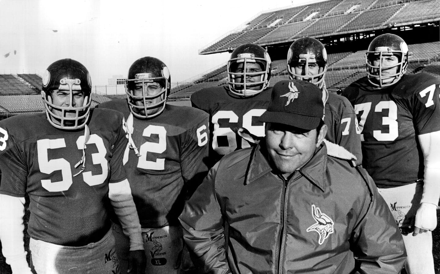 December 24, 1976: Vikings offensive line Coach John Michels and his charges: from left, center Mick Tingelhoff, guards Ed White and Charles Goodrum, tackels Steve Riley and Ron Yary.