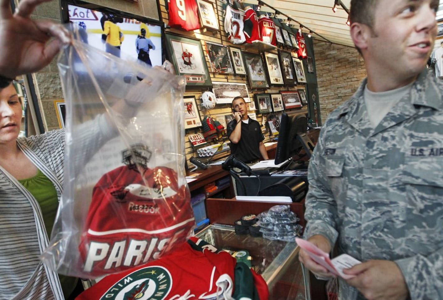 Staff Sgt. Jason Keeton came to the Hockey Lodge store at Xcel Energy Center on Thursday to pick up a Zach Parise jersey for himself and order a Ryan Suter jersey for his wife. Just $190 apiece. Orders for both the jerseys and season tickets were brisk.