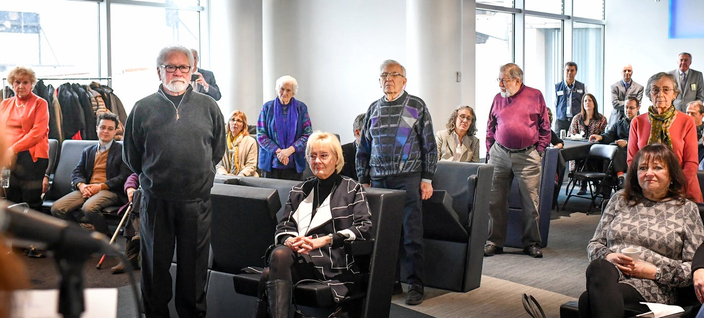 Holocaust survivors were asked to stand by the exhibit's curators, from left, Reva Kibort, Manny Gabler, Judith Maisel, Sam Rafowitz, Fred Amram and Judy Baron. Not pictured are Victor Vital and Dora Zaidenweber. &#xd2;Transfer of Memory&#xd3; Photography Exhibition on Display at MSP ] GLEN STUBBE &#x2022; glen.stubbe@startribune.com Thursday, January 11, 2018 "Transfer of Memory" Photography Exhibition on Display at MSP International Airport through February 5, 2018 Minneapolis, MN &#x2013;
The