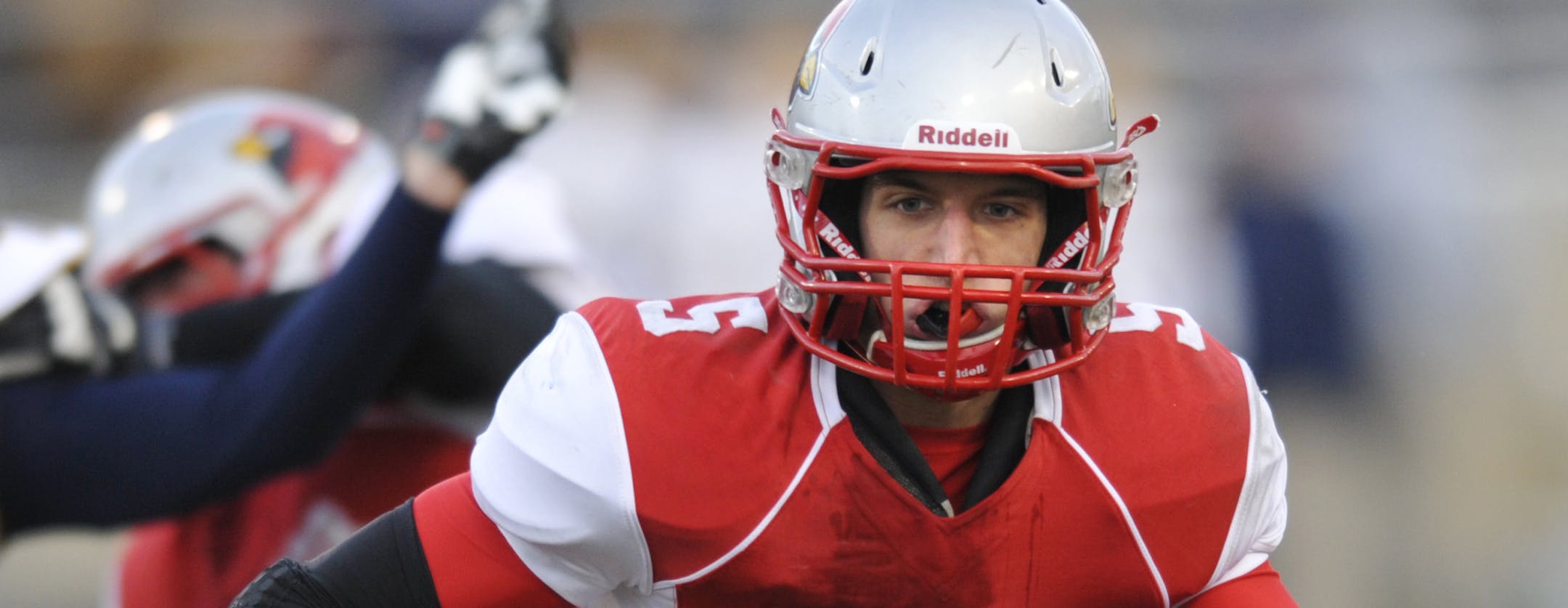 Mentor quarterback Conner Krizancic (5) rushes for a touchdown in the second quarter against Moeller in the Ohio Division I high school football championship game Saturday, Dec. 7, 2013, in Canton, Ohio. (AP Photo/David Richard) ORG XMIT: OHDR102