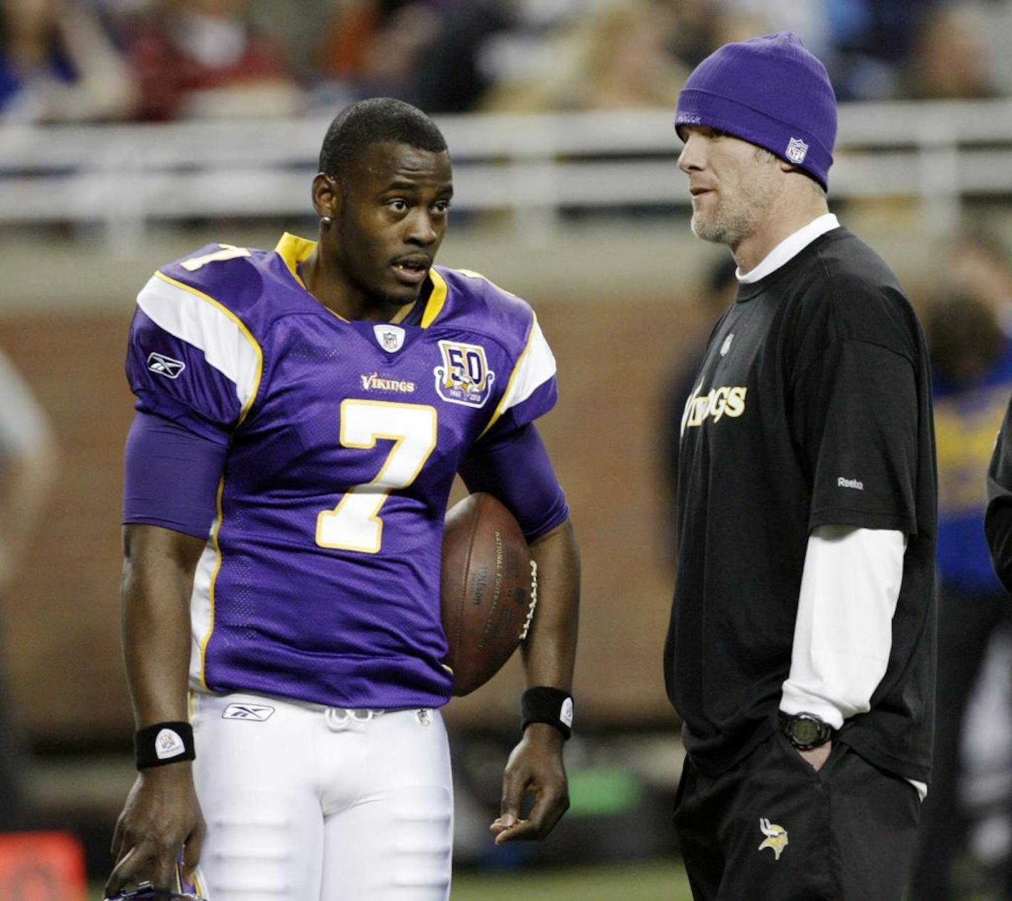 Tarvaris Jackson and Brett Favre before a game in 2010. "Tarvaris could have been anything but welcoming, but [instead he] was pure class and as good a teammate as any I've played with," Favre said in a statement from the Vikings.