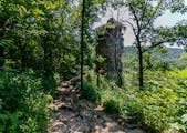 More than 100 stairs climb the steep bluff to Chimney Rock, a favorite destination for visitors to Whitewater State Park, which celebrates its 100th a