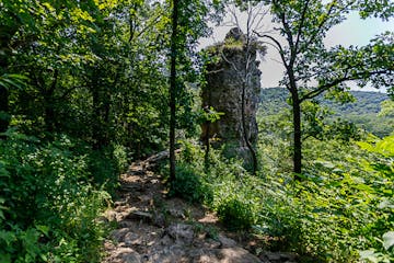 More than 100 stairs climb the steep bluff to Chimney Rock, a favorite destination for visitors to Whitewater State Park, which celebrates its 100th a