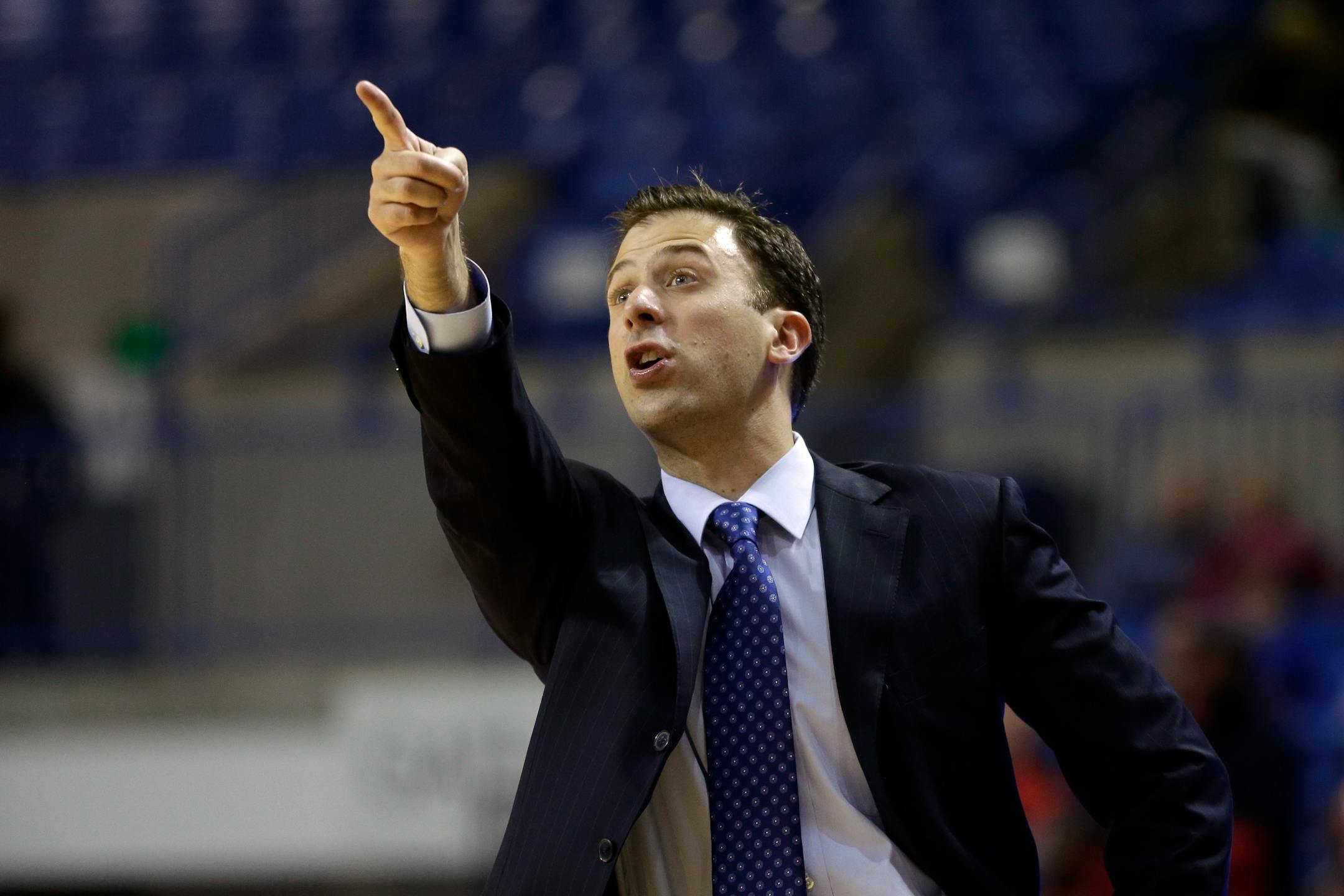 In this file photo, Florida International coach Richard Pitino gestures during the Sun Belt Conference championship college basketball game in Hot Springs, Ark., Monday, March 11, 2013.