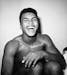 Cassius Clay in his dressing room after knocking out Archie Moore in Los Angeles in November 1962. Associated Press