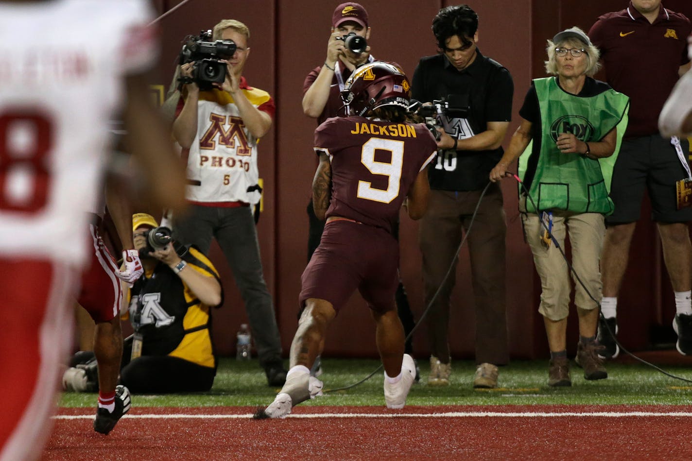 Minnesota wide receiver Daniel Jackson (9) catches the game tying touchdown against Nebraska in the second half of an NCAA college football game Thursday, Aug. 31, 2023, in Minneapolis.(AP Photo/Andy Clayton-King)