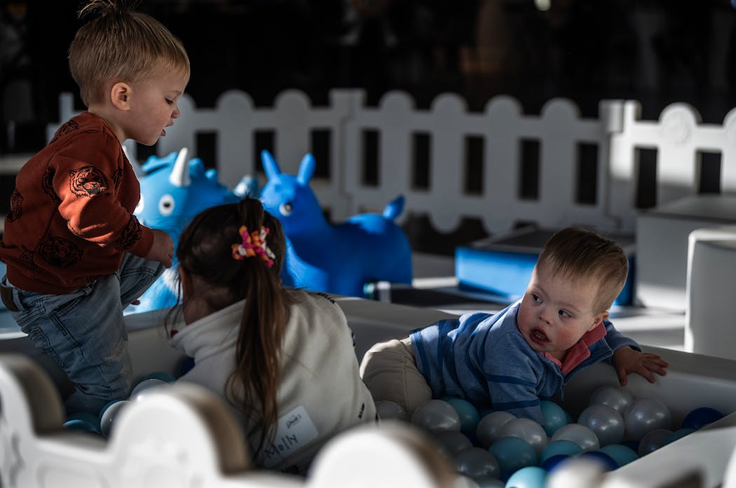 Children including 2-year-old Graham Wilson (right), play in a ball pit at the Jack's Basket 10-year-anniversary celebration. RICHARD TSONG-TAATARII • richard.tsong-taatarii @startribune.com