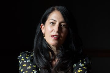 photo of poet Ada Limón in a black, flowered shirt