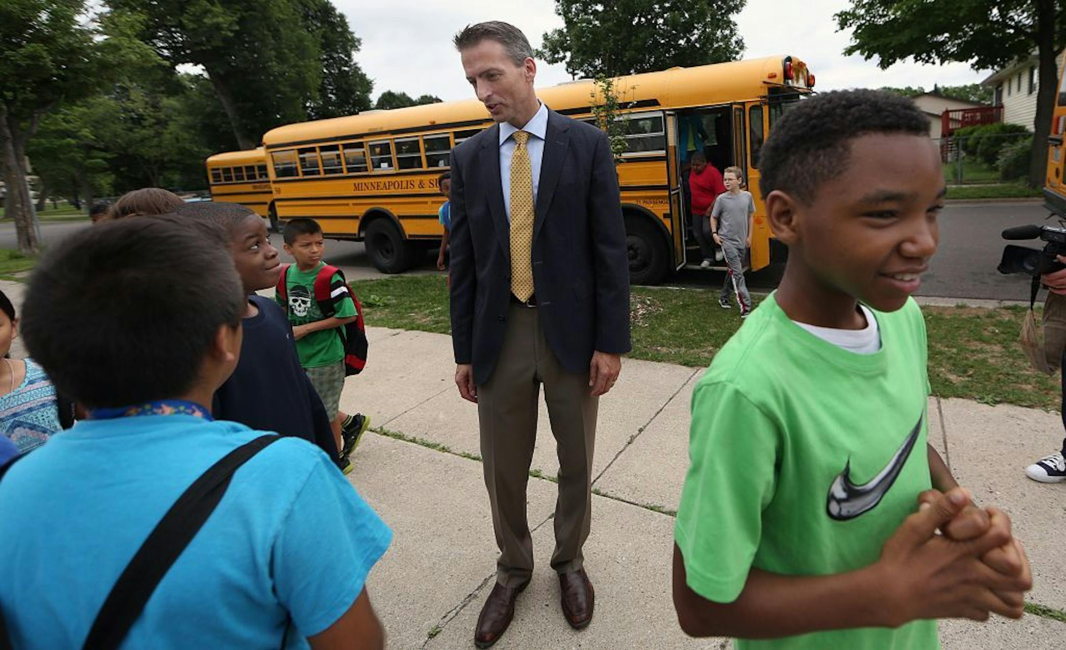 Ed Graff, new Minneapolis superintendent, greeted students on June 16 as they arrived for summer school classes at Franklin Middle School.