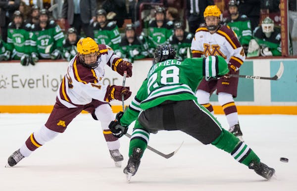 Gophers forward Mason Nevers, above against North Dakota, has seven goals and nine assists through 20 games this season. Minnesota plays St. Cloud Sta