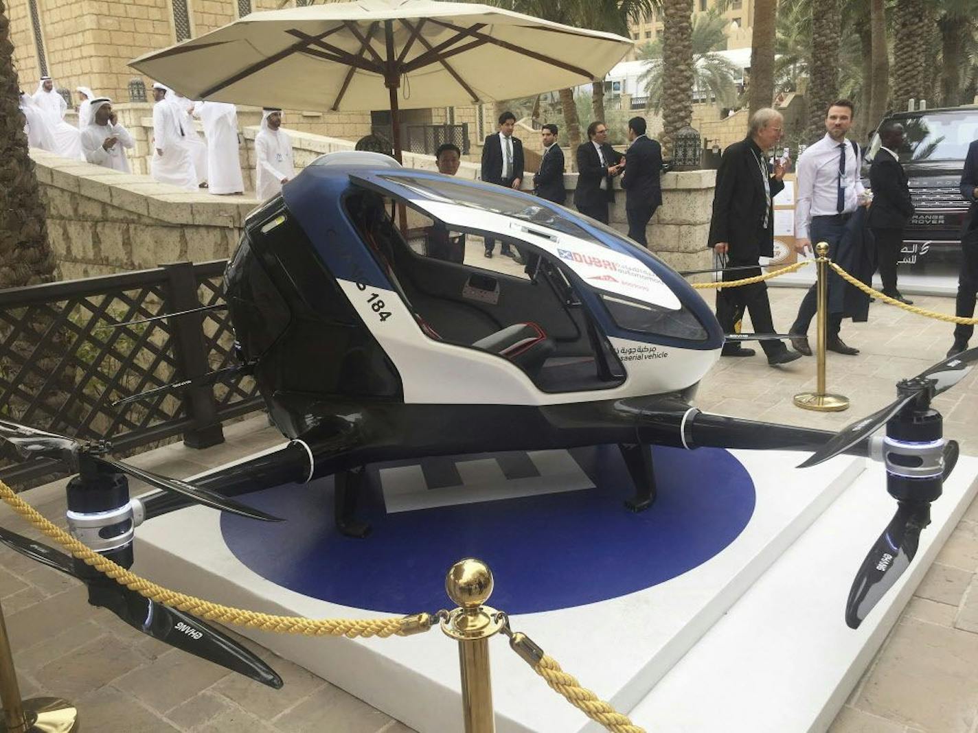 A model of EHang 184 and the next generation of Dubai Drone Taxi is seen during the second day of the World Government Summit in Dubai, United Arab Emirates, Monday, Feb. 13, 2017. Dubai hopes to have a passenger-carrying drone buzzing through the skyline of this futuristic city-state in July. Mattar al-Tayer, the head of Dubai's Roads & Transportation Agency, made the surprise announcement Monday at the World Government Summit.