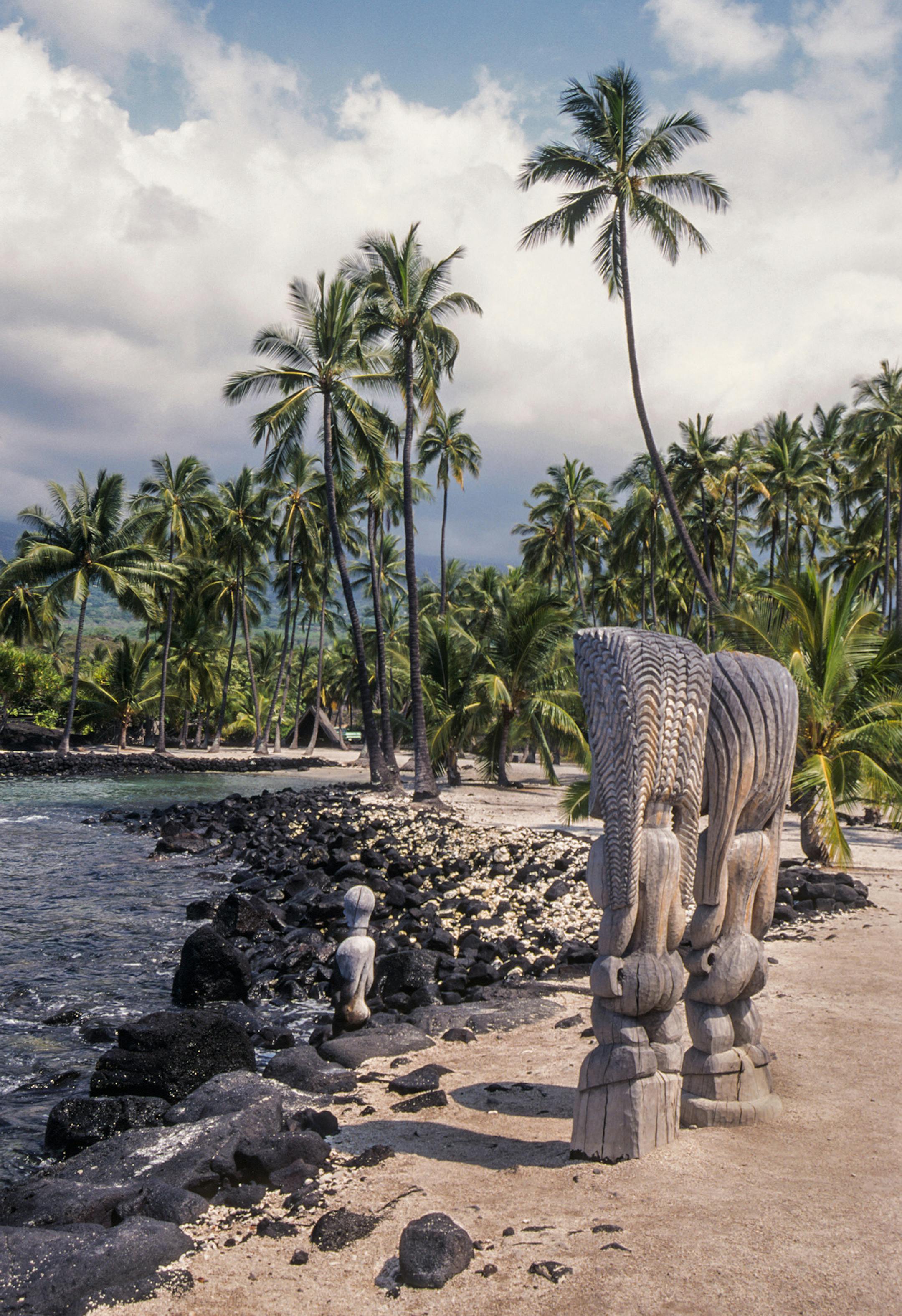 Wooden ki'i (carvings) stand guard facing the ocean at Pu'uhonua O Honaunau National Historic Park (the City of Refuge), South Kona, Big Island, Hawaii. (Steve Haggerty/TNS)