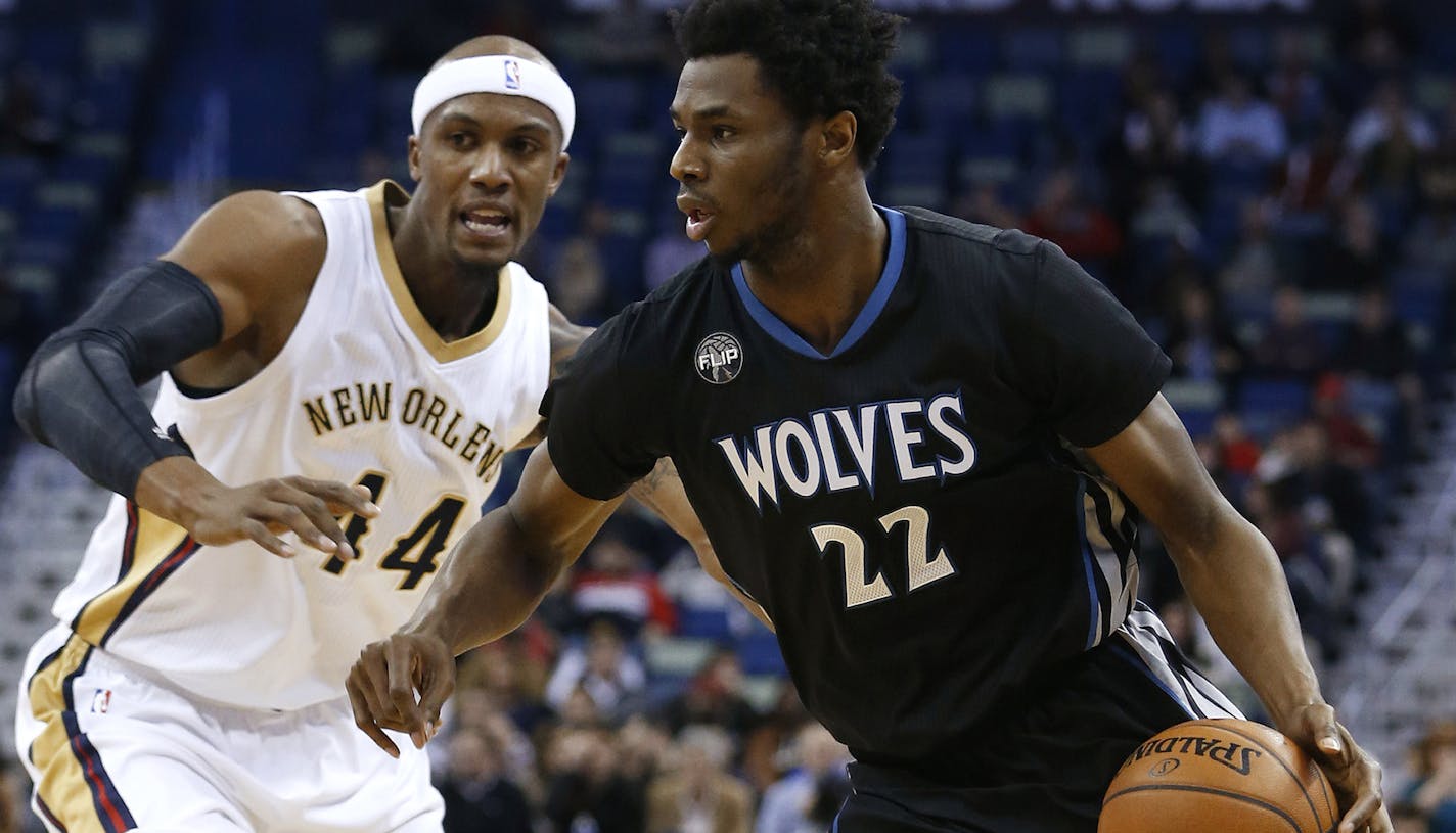 Minnesota Timberwolves guard Andrew Wiggins (22) drives against New Orleans Pelicans forward Dante Cunningham (44) during the first half of an NBA basketball game Tuesday, Jan. 19, 2016, in New Orleans. The Pelicans won 114-99. (AP Photo/Jonathan Bachman)