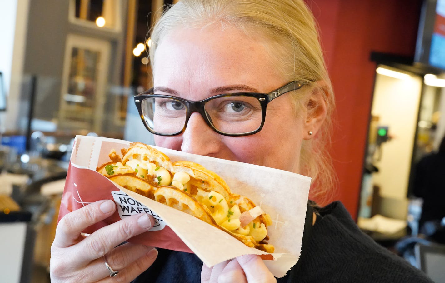 Nordic Waffles owner Stine Aasland held a Bacon, Mac & Cheese waffle at her stand which is inside Rosedale Mall&#x2019;s new food hall, Potluck. ] GLEN STUBBE &#x2022; glen.stubbe@startribune.com Thursday, December 12, 2019 Restaurant trend: Food halls. Nordic Waffles owner Stine Aasland runs a stand just inside the mall entrance in Potluck, Rosedale's new food hall (upper level, near Von Maur) What's Happening at this time: Rick Nelson, 612 269 4443. Aasland will be working at her stand. Please