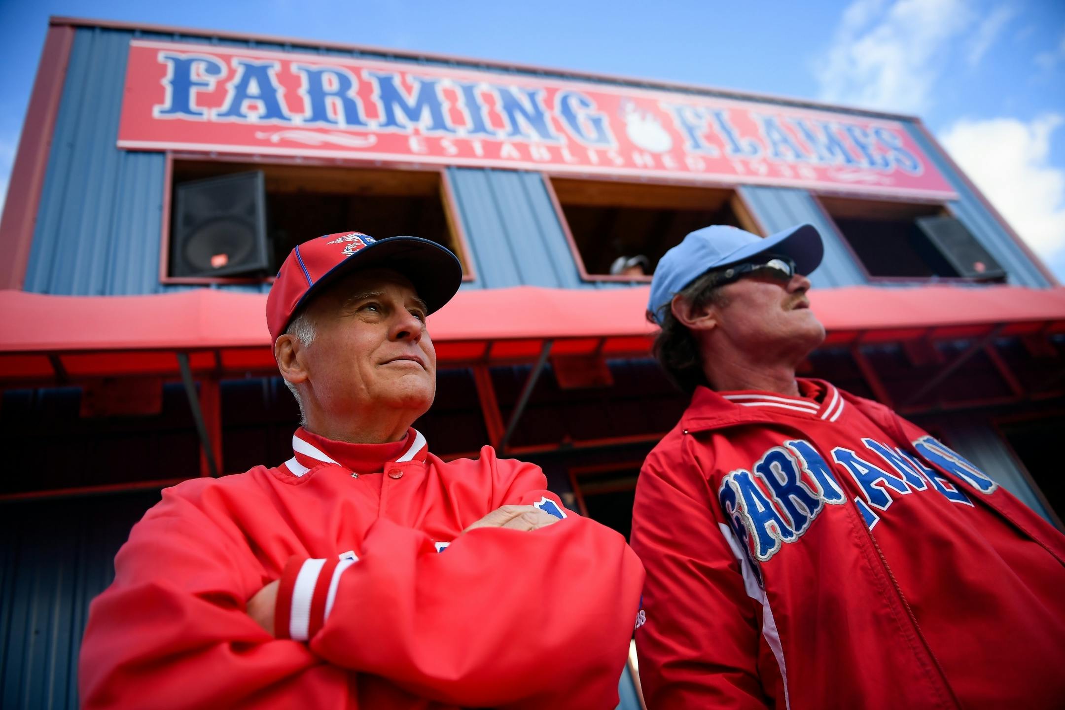 Cousins Jeff Mergen, left, and Kerry Mergen watched a game between the Sartell Muskies and Farming on Friday, June 23, 2017 during the Farming Invitational Tournament in Farming, Minn. Both Jeff and Kerry played baseball for Farming in the 70's and 80's respectively and Kerry's twin sons currently play for the team.