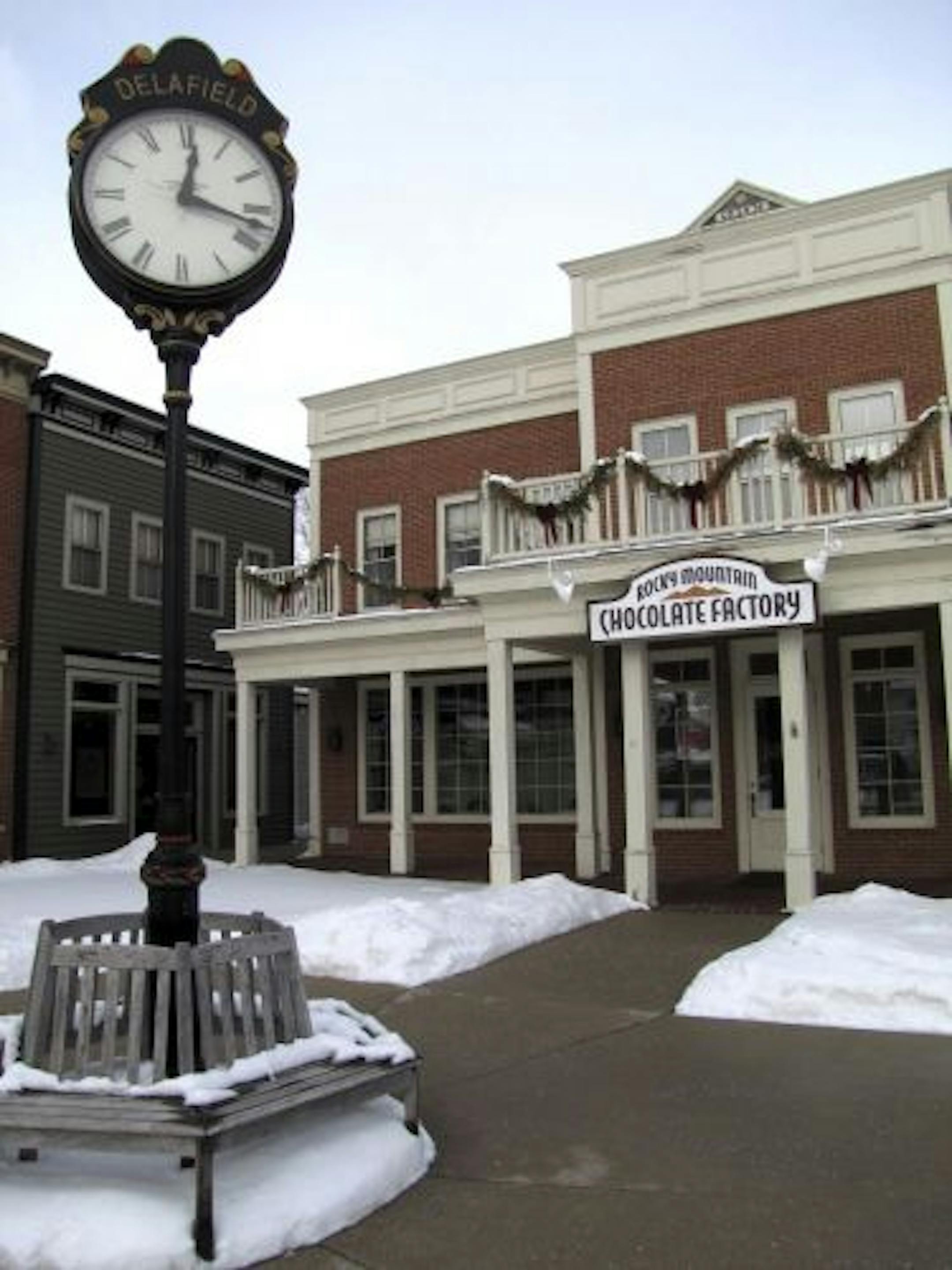 Much of the downtown in Delafield, Wis., has a colonial American look, after redevelopment by Bob Lang of folk-art wall calendar fame.