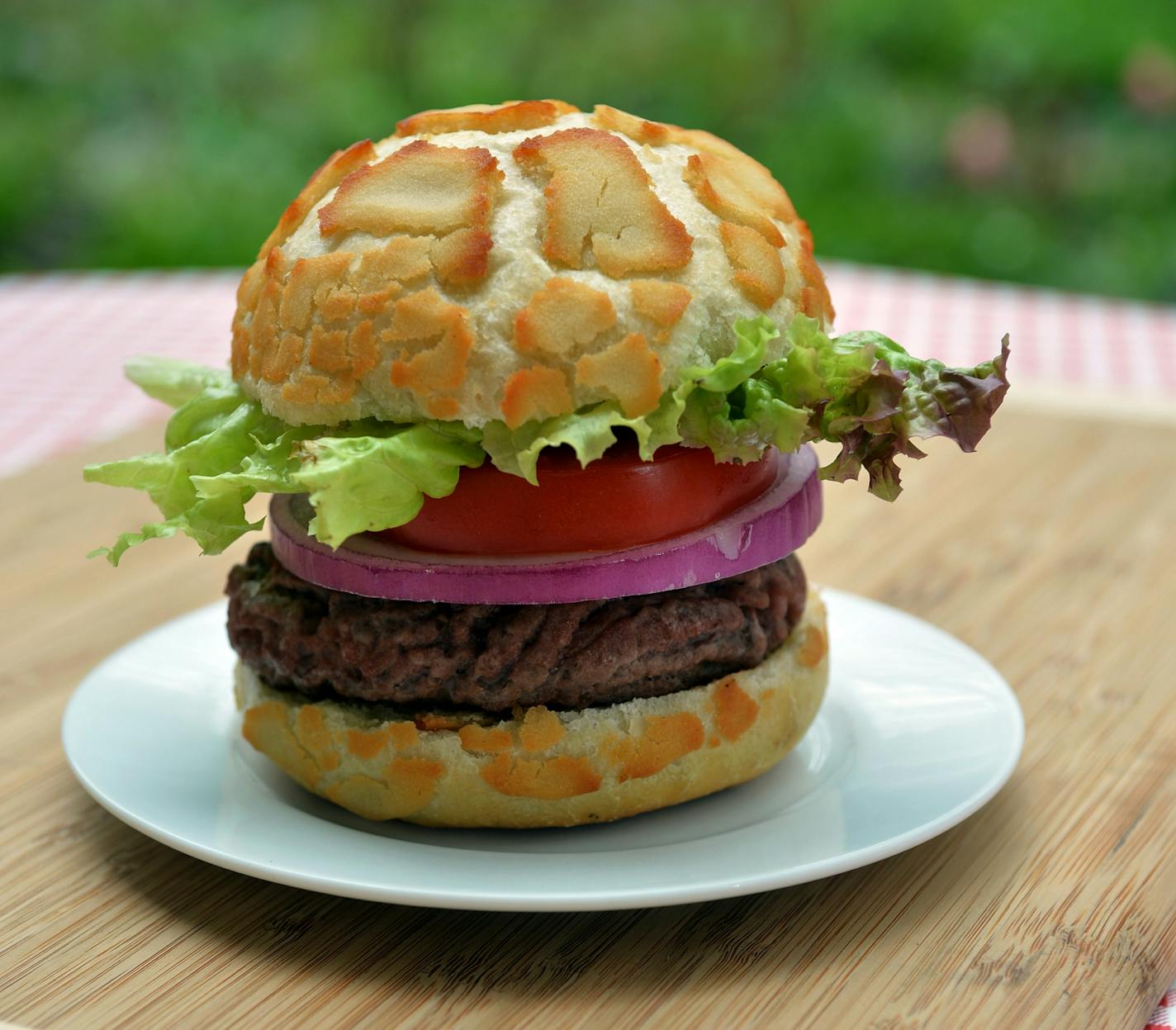 Hamburger buns are a golden brown with a crackled, mottled top.