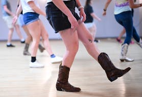 New country songs are attracting young line dancers like Mae Meyer of Lakeville at West Medicine Lake Community Club in Plymouth.
