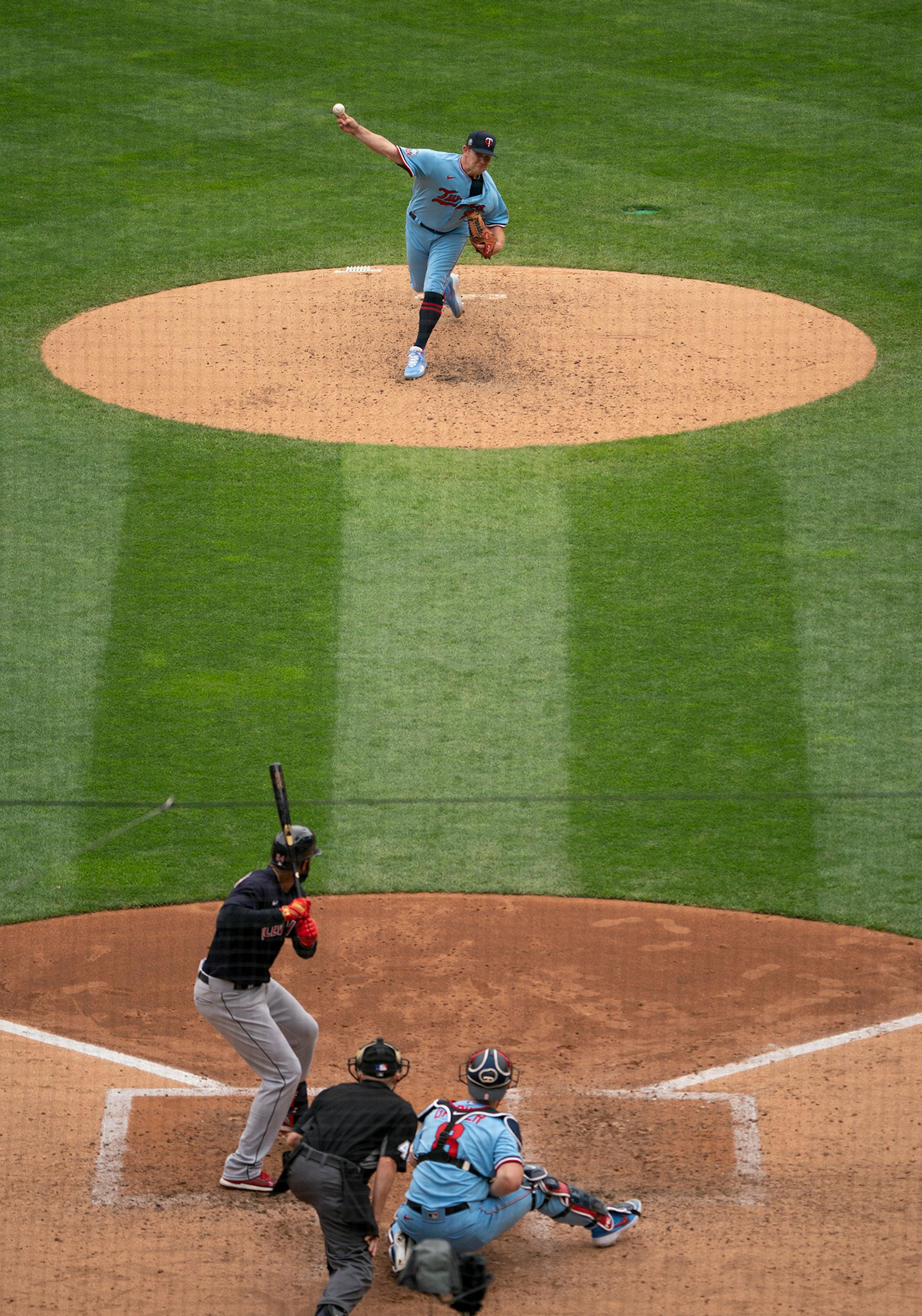 Minnesota Twins relief pitcher Tyler Duffey (21) struck out Cleveland Indians first baseman Domingo Santana (41) with this seventh inning pitch.