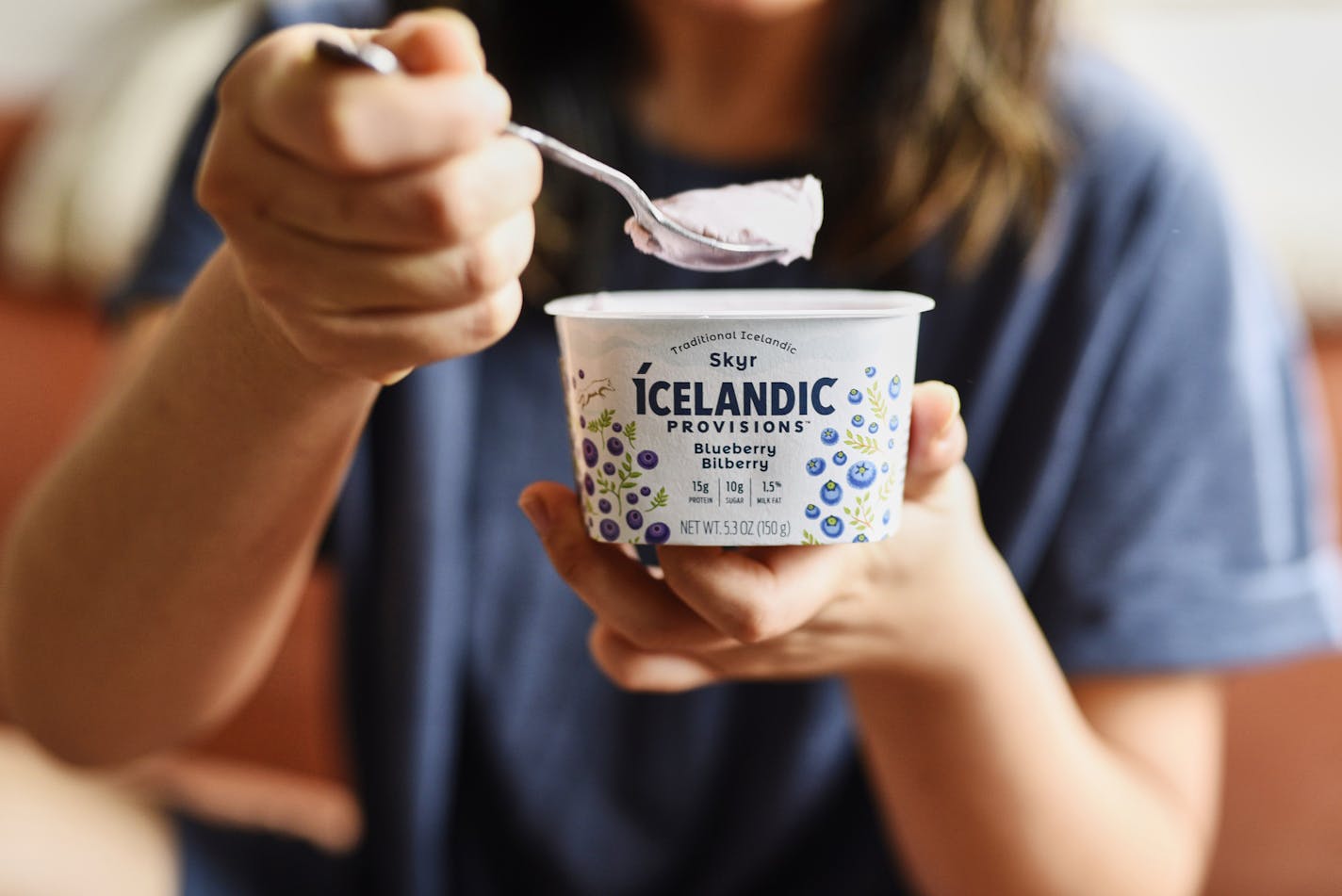 A container of Icelandic Provisions Skyr blueberry yogurt.