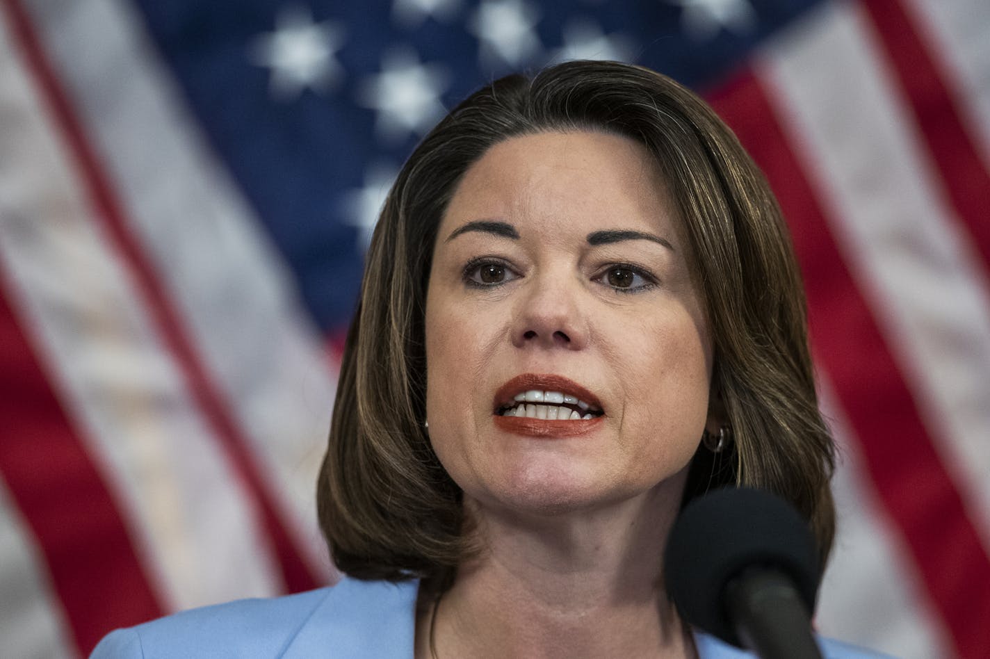 Rep. Angie Craig, D-Minn., speaks during news conference unveiling of the Patient Protection and Affordable Care Enhancement Act on Capitol Hill in Washington on Wednesday, June 24, 2020. (AP Photo/Manuel Balce Ceneta)