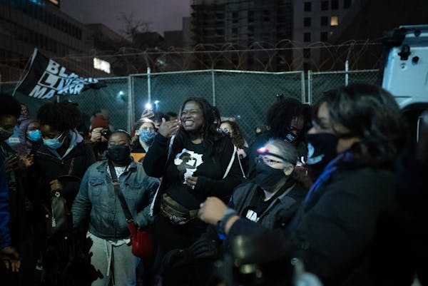 Civil rights activist Nekima Levy Armstrong danced as more than hundred protesters gathered for a late-evening demonstration against police violence F
