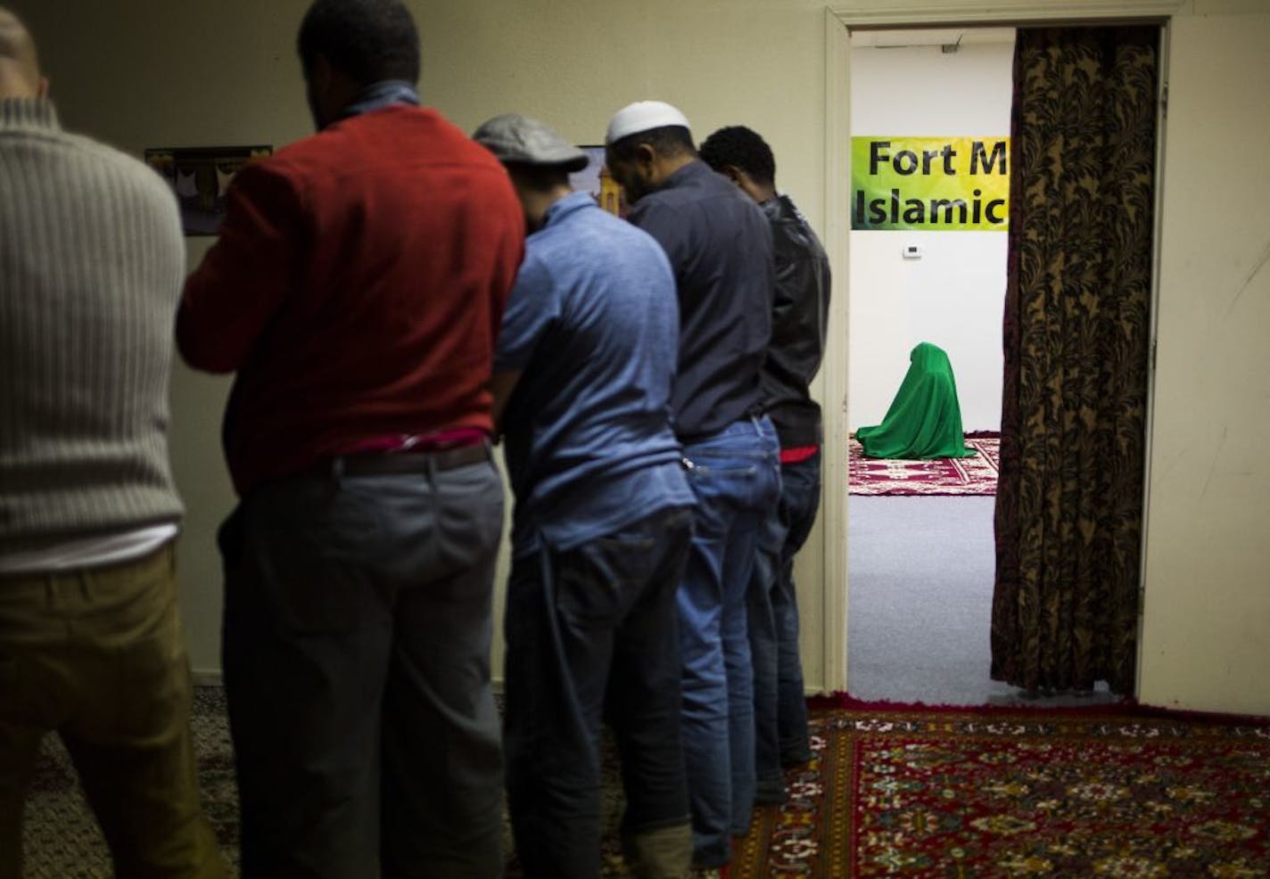 Muslims praying at the Islamic Center in Fort Morgan, Colo., Feb. 27, 2016. After top managers said that religious breaks would be severely curtailed, dozens of employees walked out of the Cargill Meat Solutions plant in 2015.