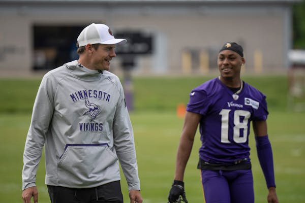 Viking coach Kevin O’Connell walked with Justin Jefferson at the team’s mini-camp on Wednesday at TCO Performance Center.