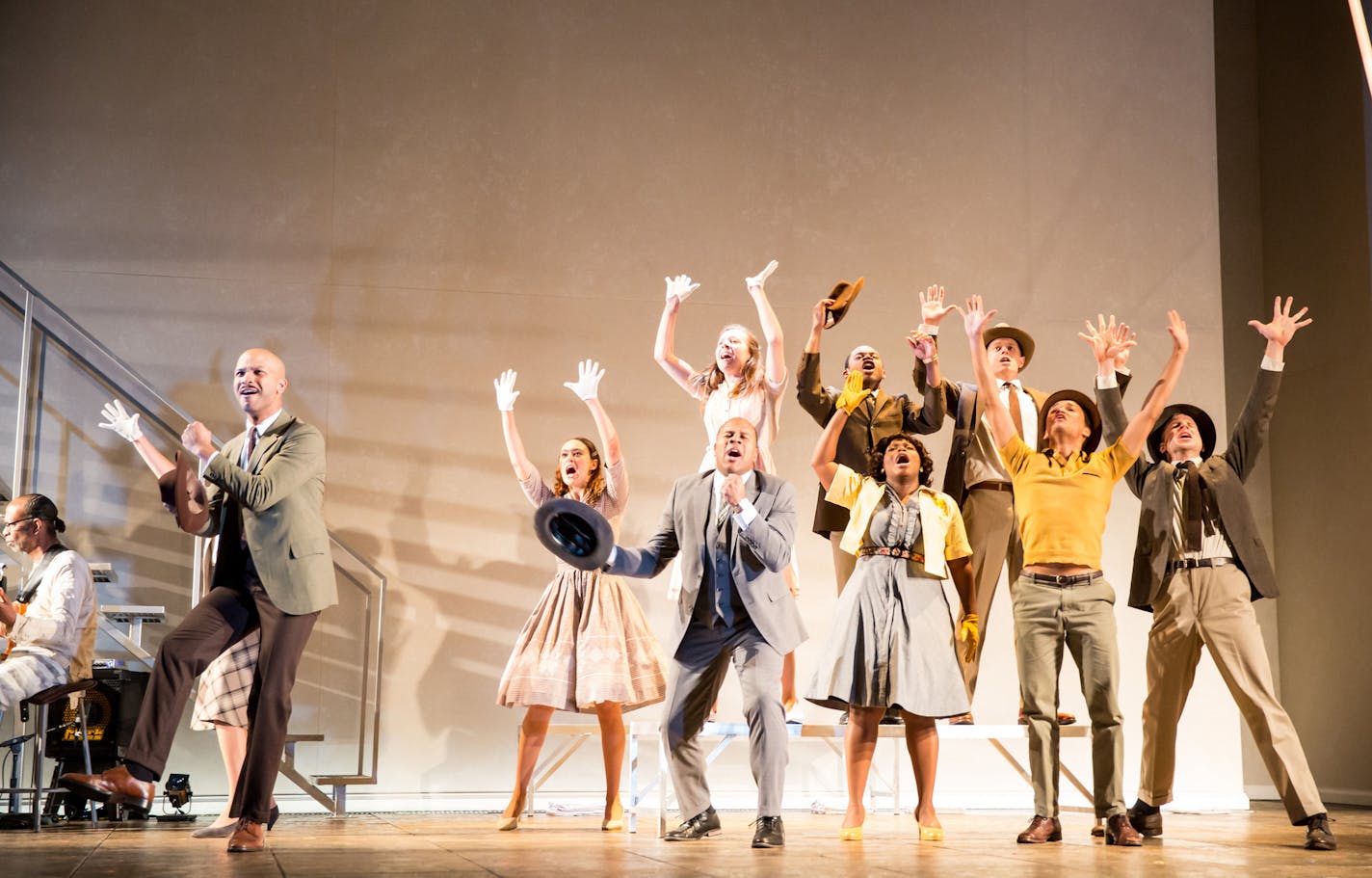 The cast of the Guthrie Theater's The Parchman Hour, written by Mike Wiley and directed by Patricia McGregor. Scenic design by Clint Ramos, costume design by Katherine O'Neill, lighting design by Jiyoun Chang. October 1 - November 6, 2016 on the McGuire Proscenium Stage at the Guthrie Theater, Minneapolis. Photo by Dan Norman.