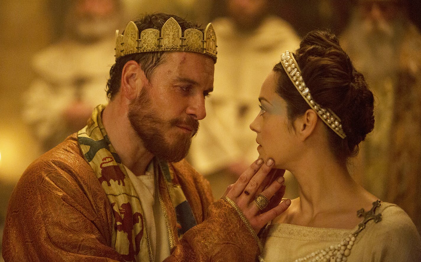 This photo provided by The Weinstein Company shows, Michael Fassbender, left, as Macbeth, and Marion Cotillard as Lady Macbeth, in a scene from the film, "Macbeth." (Jonathan Olley/The Weinstein Company via AP)