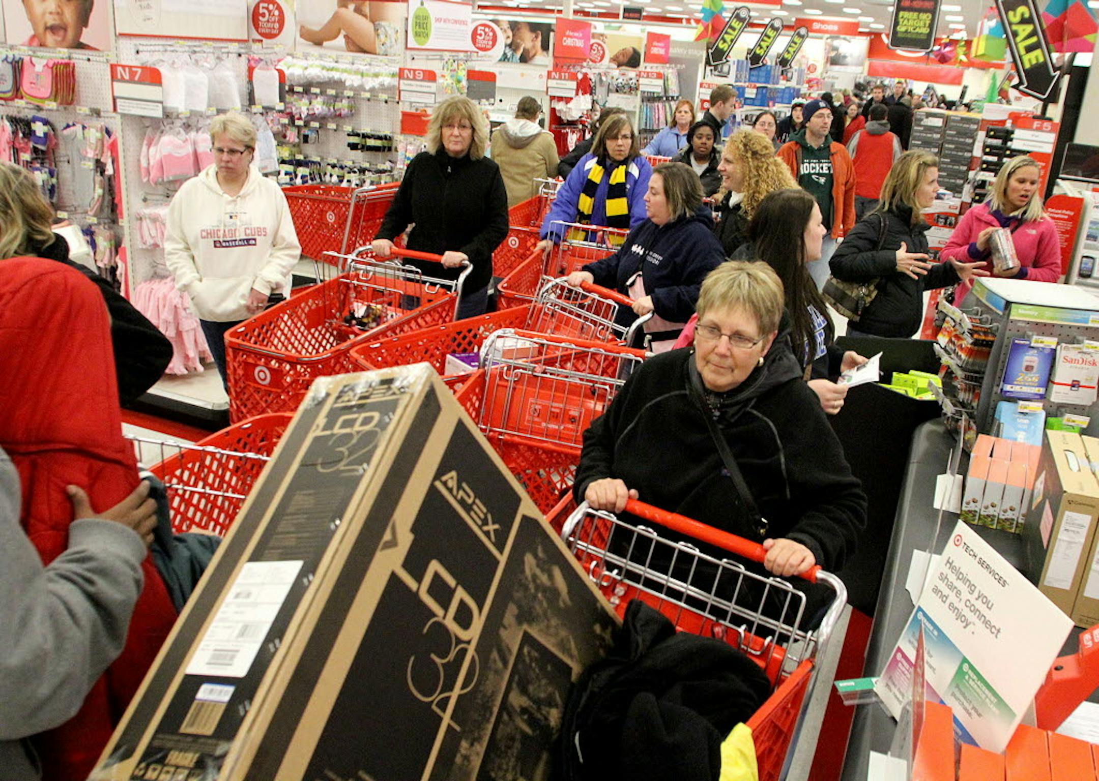 A sea of people gather near the electronics section at Target just minutes after the doors open in Muskegon, on Thursday Nov. 22, 2012.