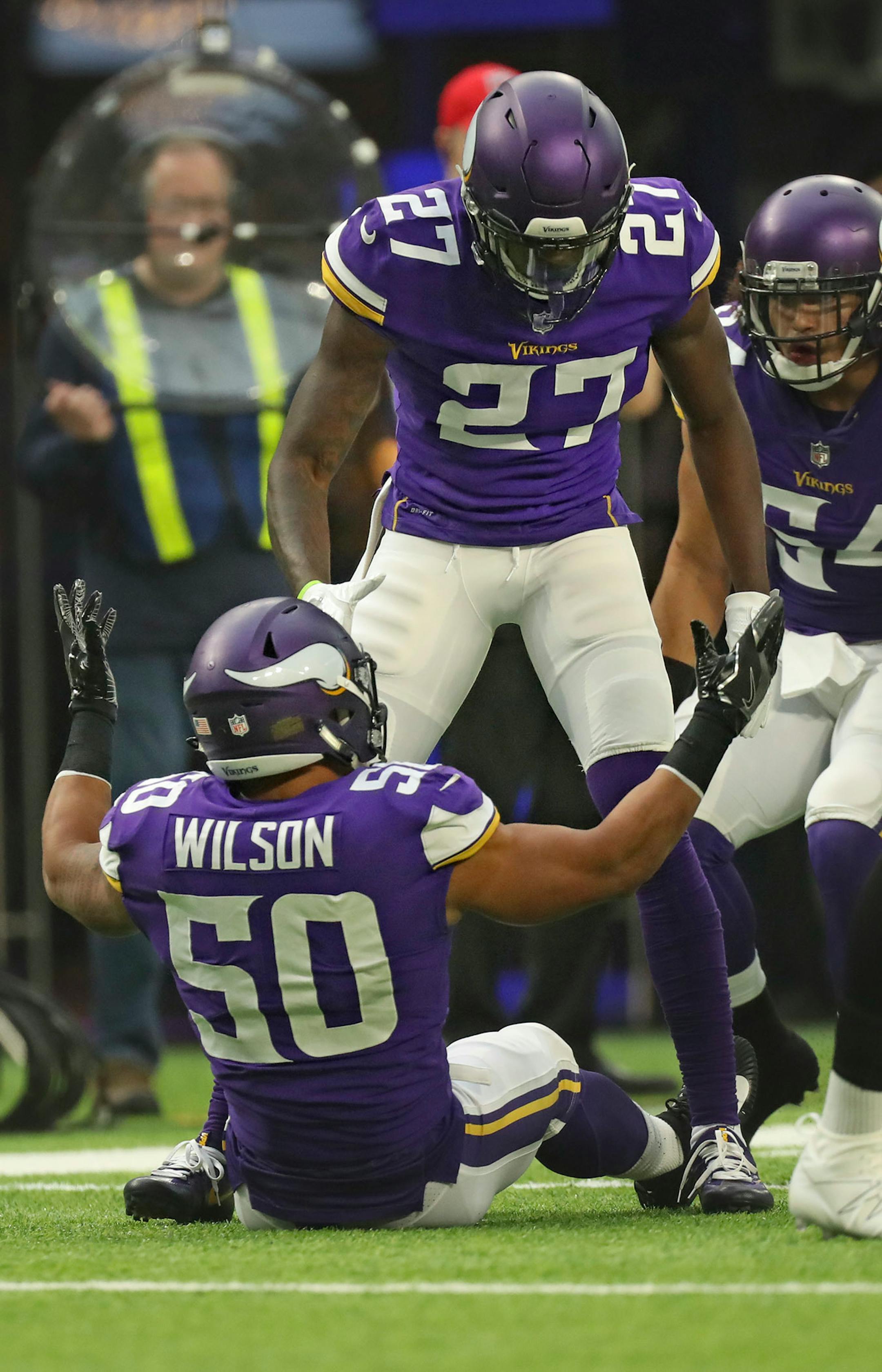 Vikings linebacker Eric Wilson (50) gestured in disbelief after being flagged for a penalty Sunday while defending Cincinnatti Bengals receiver Alex Erickson in the first half Sunday at U.S.Bank Stadium.