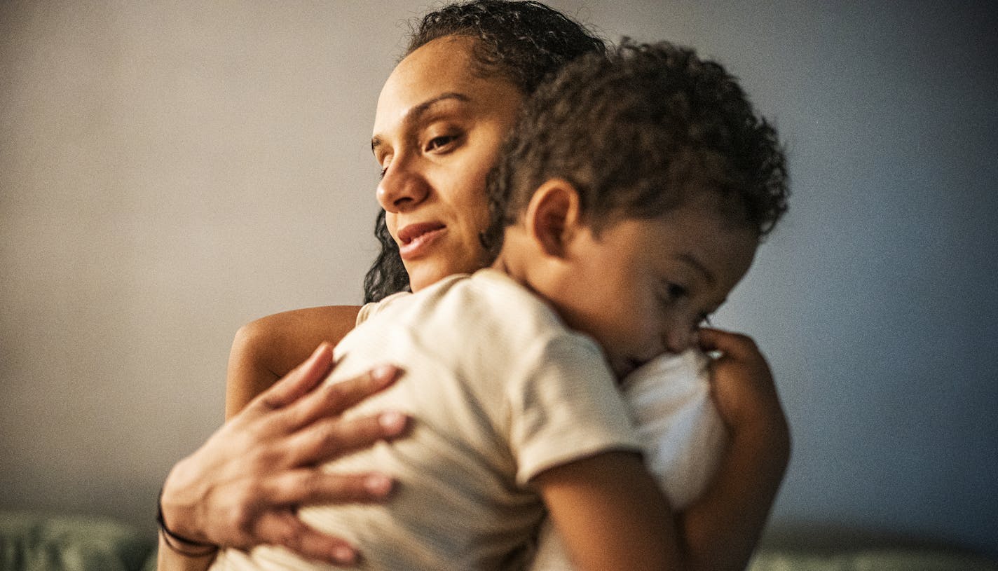 Jasmine Laducer-Kitto can finally hug her 2-year old Eloheem after taking a shower and changing clothes.] There are days when Jasmine Laducer-Kitto is afraid to walk into the St. Paul nursing home where she has been working 70-hour weeks as a nursing assistant during the coronavirus pandemic. RICHARD TSONG-TAATARII • richard.tsong-taatarii@startribune.com