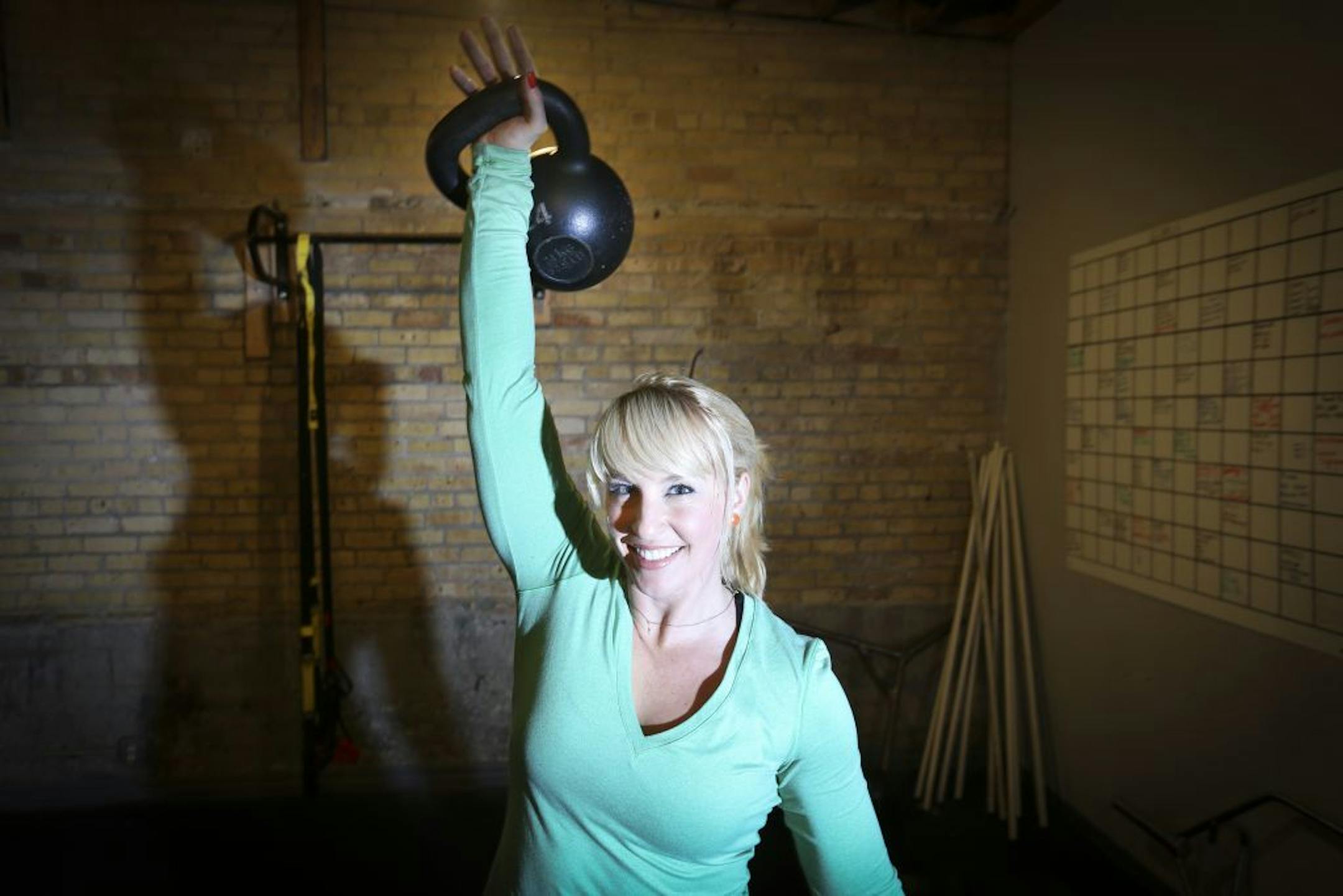 Jen Sinkler posed for a photograph at the gym The Movement that she owns with her husband.